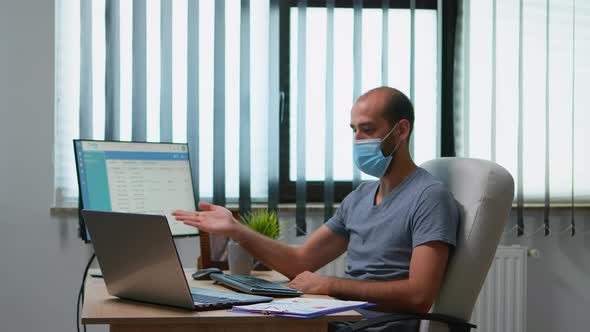 Chatting To Colleagues Using Video Call alt