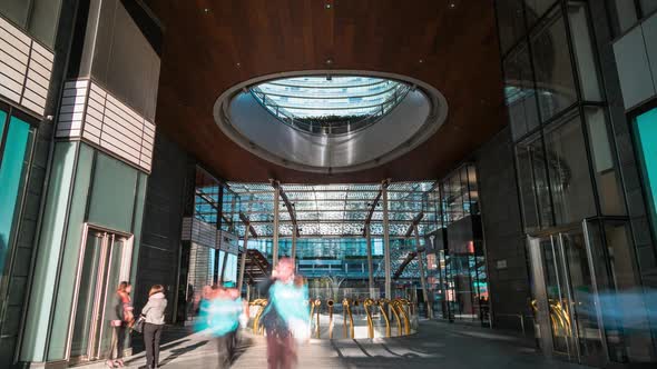 People walking in Gae Aulenti square, Milan, Italy, timelapse, 4k
