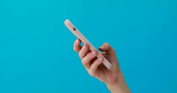 Closeup Phone in Hand Studio Side View alt