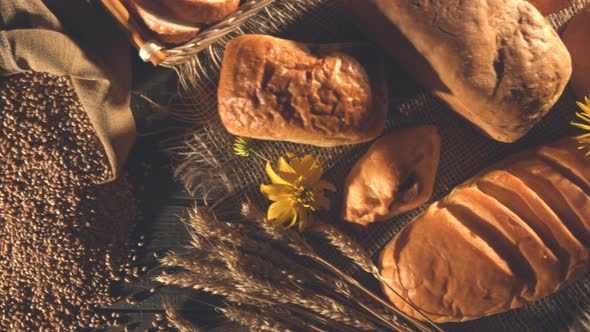 Still life with Bread, Wheat, Flour and Flowers