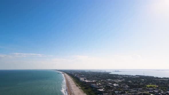 Beautiful Cocoa Beach Coastline in Florida, Aerial Landscape Tilt-Down alt