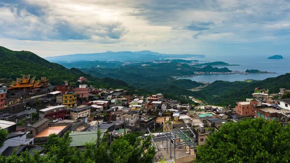 time lapse of Jiufen village with mountain and east china sea, Taiwan alt