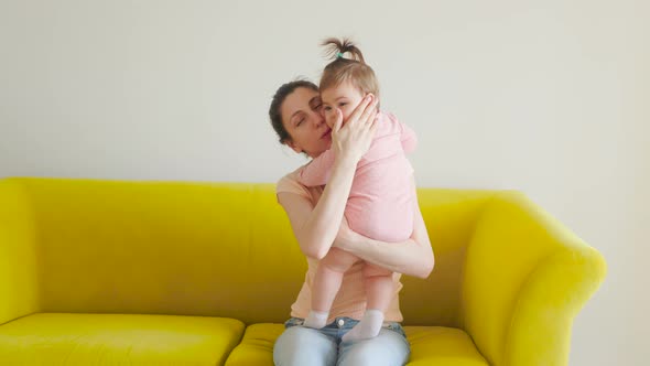 Authentic Footage of a Loving Tender American Young Mom Holding Adorable Cute Baby alt