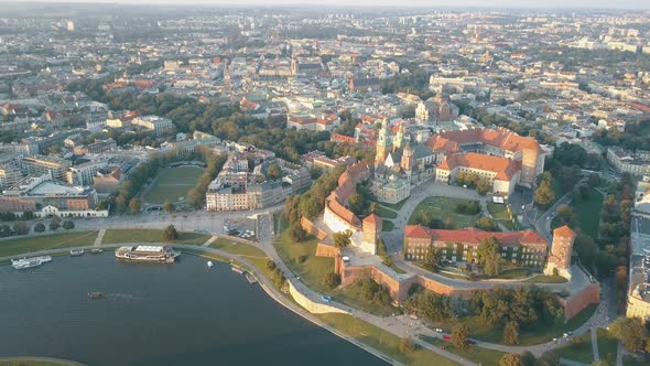 Aerial View of Royal Wawel Cathedral and Castle in Krakow, Poland, with Vistula River, Park, Yard alt