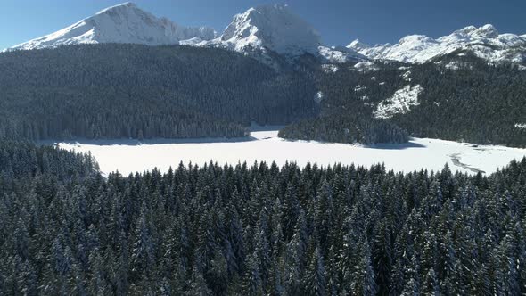 Aerial Winter View of Snow Covered Black Lake in Durmitor Mountains National Park