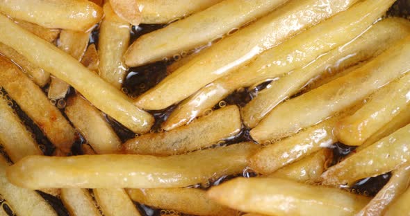 French Fries Fried in Boiling Oil.  alt