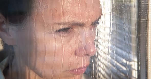 Looking Through Raining Glass alt