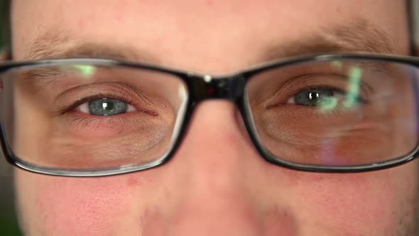 Eyes of a Man in Glasses Closeup