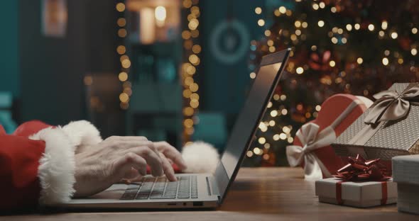 Santa Claus connecting online at Christmas