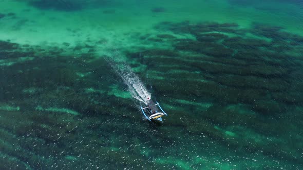 Boat with Tourists Sailing Indian Ocean Bali Indonesia alt