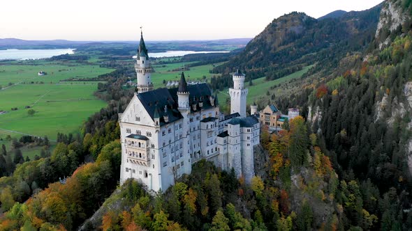 Aerial View of Neuschwanstein Castle Before Sunset, Autumn in Germany