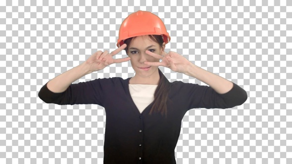Female construction worker in helmet making, Alpha Channel