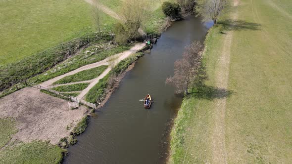 Cute Couple Enjoying A Boat Ride In The Park