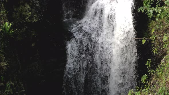 White water flowing over falls, Natural Bridge Waterfall Springbrook, Queensland alt