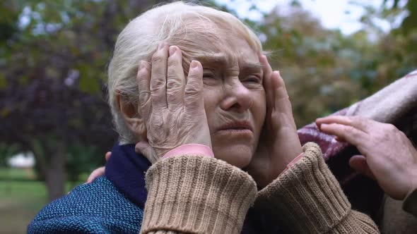 Mature Woman Complaining on Pain Feeling Headache, Aged Man Supporting Her