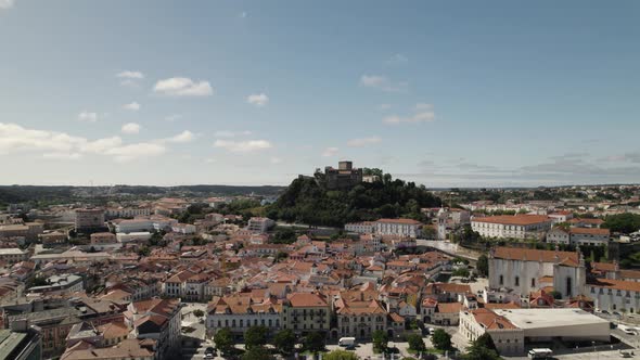 Strategic defensive hilltop setting of Leiria Castle, Portugal; aerial view