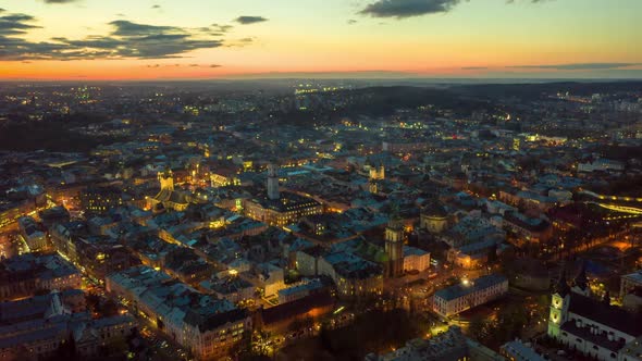 Flight Above the Roofs on Sunset. Old European City. Ukraine Lviv