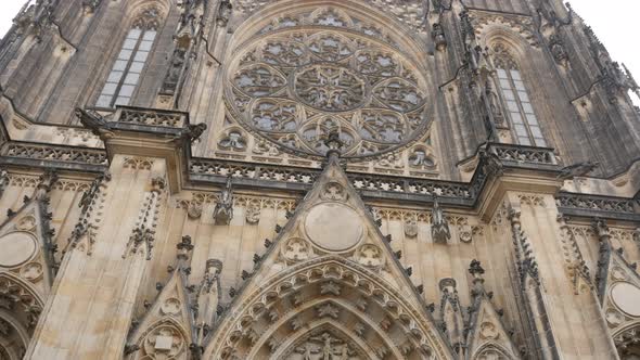 Metropolitan Cathedral of Saints Vitus Wenceslaus and Adalbert facade slow tilt 4K 2160p 30fps Ultra alt