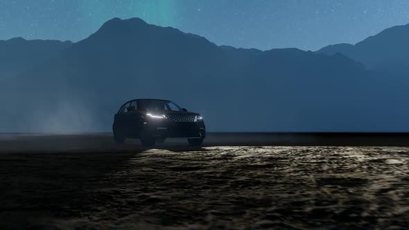 SUV Driving Through Mountain Terrain at Night