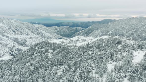 Drone Flying Above Cinematic Mountain Landscape at Winter alt