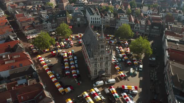 Aerial View Of Gouda's 15th Century Town Hall With Market In Gouda, Netherlands. - ascend alt
