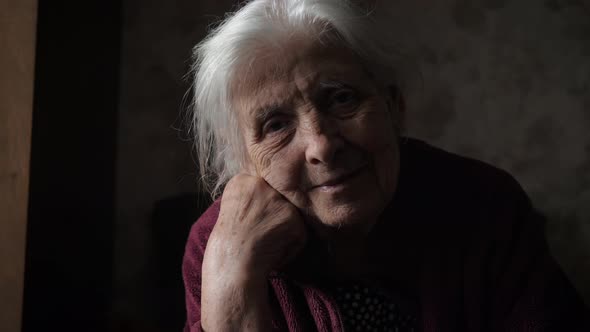 Portrait Of Very Old Elderly Caucasian Woman With Gray Hair And Wrinkled Face alt