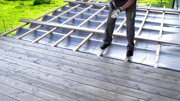 Fixing a wooden terrace board 4K