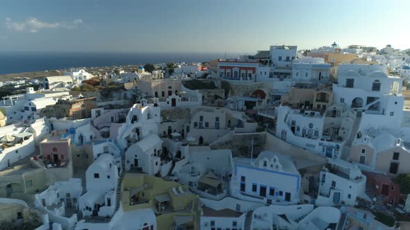 Aerial View Flying Over City of Oia on Santorini Greece alt