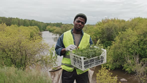 Black Man with Seedlings alt