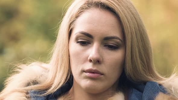 Sad Woman Looking at Camera, Feels Insecure and Depressed, Disappointed in Life alt