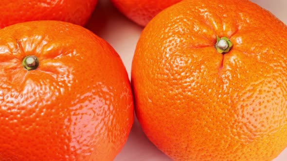 Ripe Tangerines Spinning Closeup Slow Mo