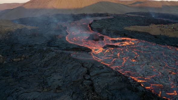 Local People Watching River Of Hot Viscous Lava Flowing On Earth Surface. Fagradalsfjall Eruption alt
