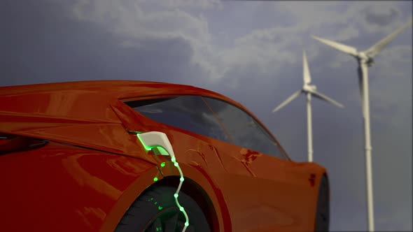 Generic electric red car charging with wind turbines in background