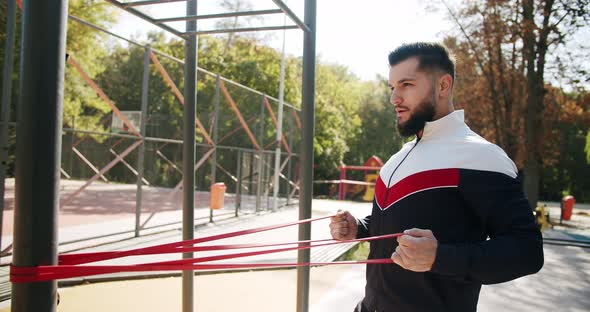 Attractive Fitness Man Does Exercising Outside alt