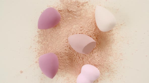 Makeup Sponges Makeup Brush on Beige Background alt