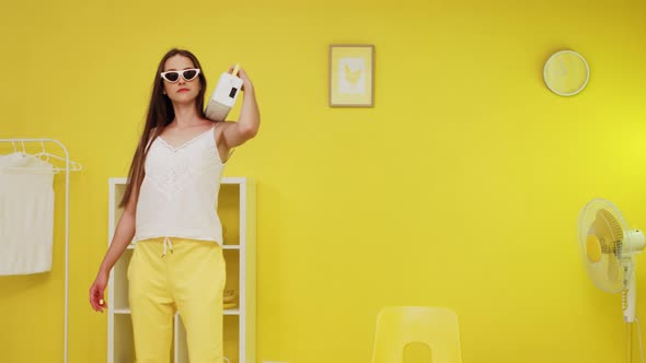 Stylish Woman Is Listening Music On Cassette Recorder alt