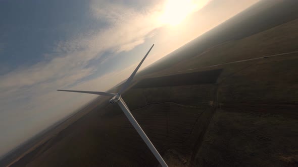 Shooting From Sports Fpv Drone Huge Windmill on Natural Field with Sunset Blue Sky Alternative alt