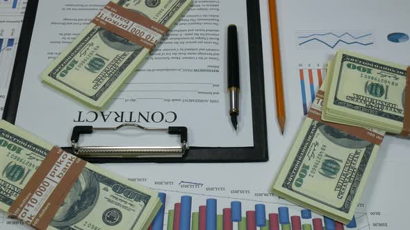 Business Contract And Money On The Desk In The Office alt