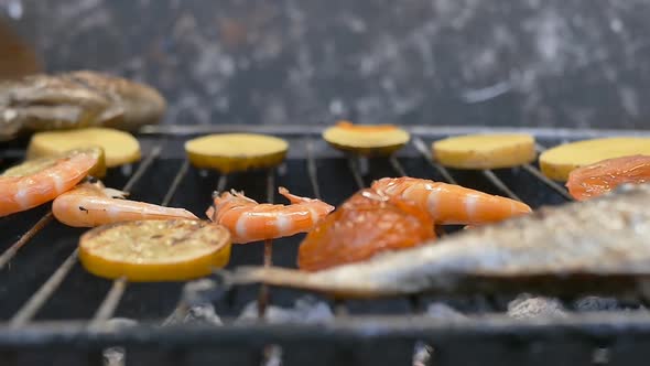 Grilling Shrimp Fish and Vegetables on a Wire Rack