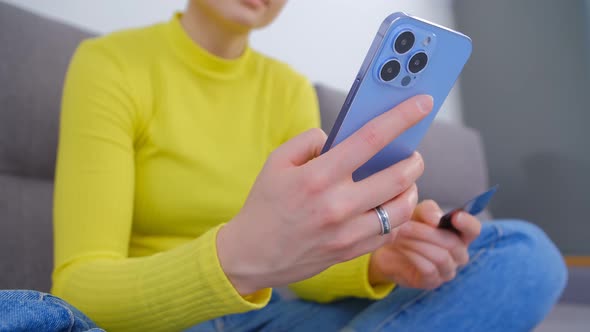 Paying with credit card online. Internet shopping concept. Customer making purchase in mobile app alt