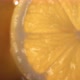Rolling Half of Fresh Lemon and Opening the Inside of the Fruit in Slow Motion - VideoHive Item for Sale