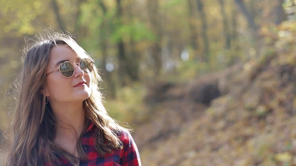 Young woman portrait in autumn Park alt