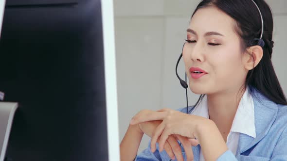 Customer Support Agent or Call Center with Headset Talking to Customer on Phone alt