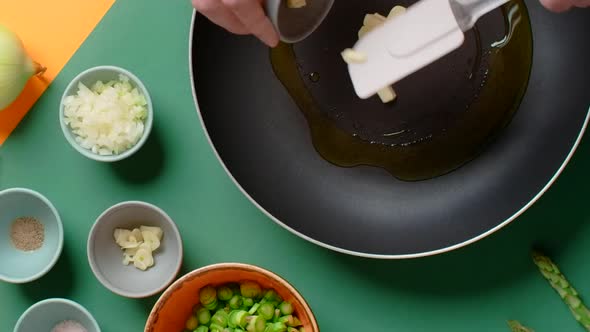 Vertical Video Recipe Chef Adds Butter and Olive Oil to the Hot Pan
