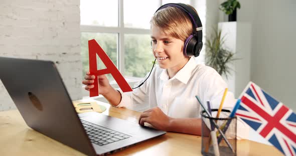 Boy Studying English Online Laptop