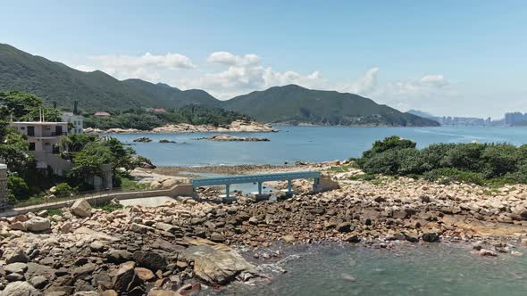 Blue Lover bridge in Shek O, Hong Kong, aerial drone view alt