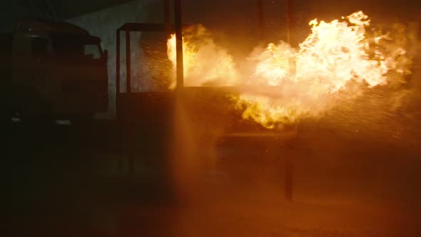 Slow motion of fire being extinguished with water alt