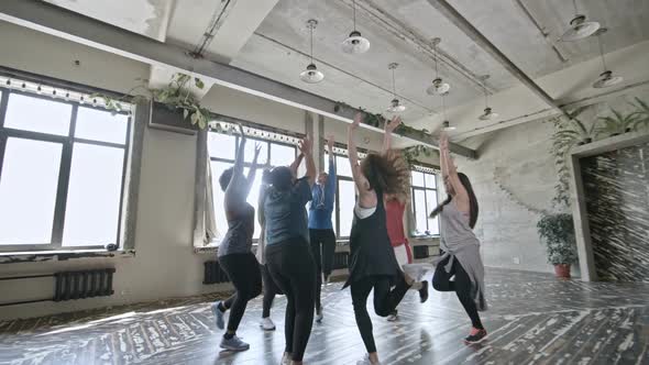 Energetic Women Doing Aerobics in Circle alt