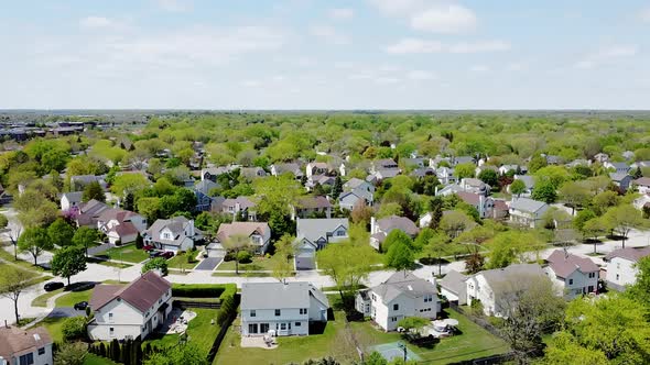 Aerial Drone View Suburban Neighborhood with Identical Wealthy Villas Each Other
