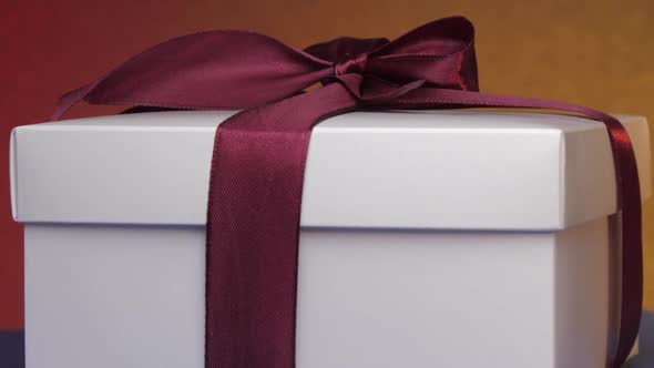 White Present Carton Box with Purple Ribbon and Bow alt
